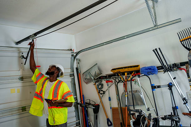 Professional Garage Door Panel Replacement technician working in Barton, NM